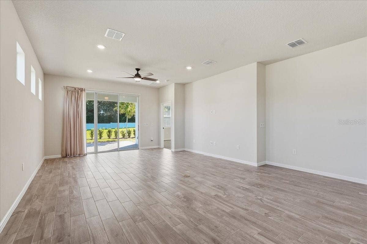 Cafe and Gathering Room - Sliding Doors to Pavered Lanai