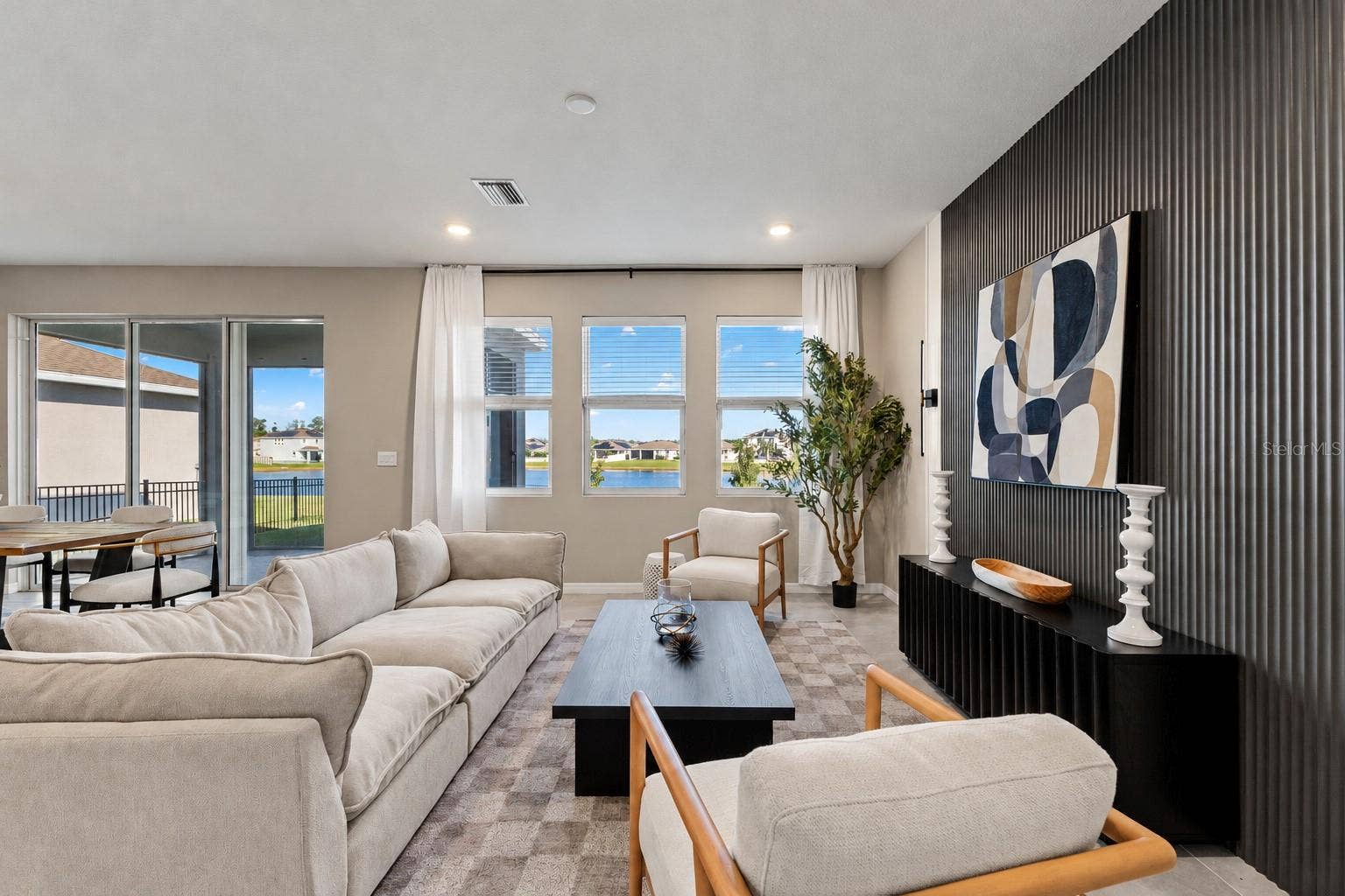 Living room with pond outlook - 5126 Jackel Chase Dr, Wimauma