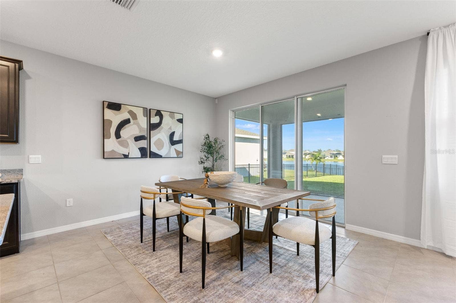 Dining area and slider - 5126 Jackel Chase Dr, Wimauma