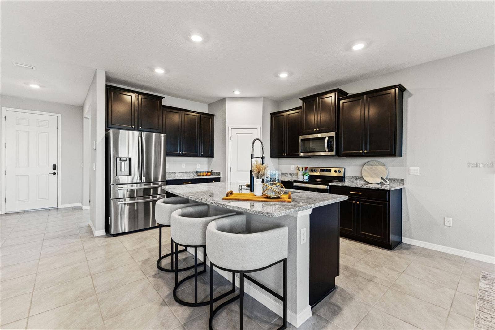 Kitchen and island - 5126 Jackel Chase Dr, Wimauma