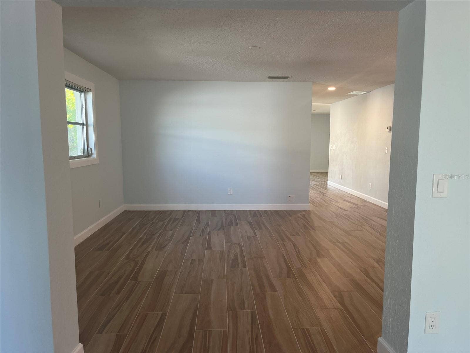 307 LA HACIENDA DRIVE, Indian Rocks Beach, FL 33785 Heading towards the dining and living area