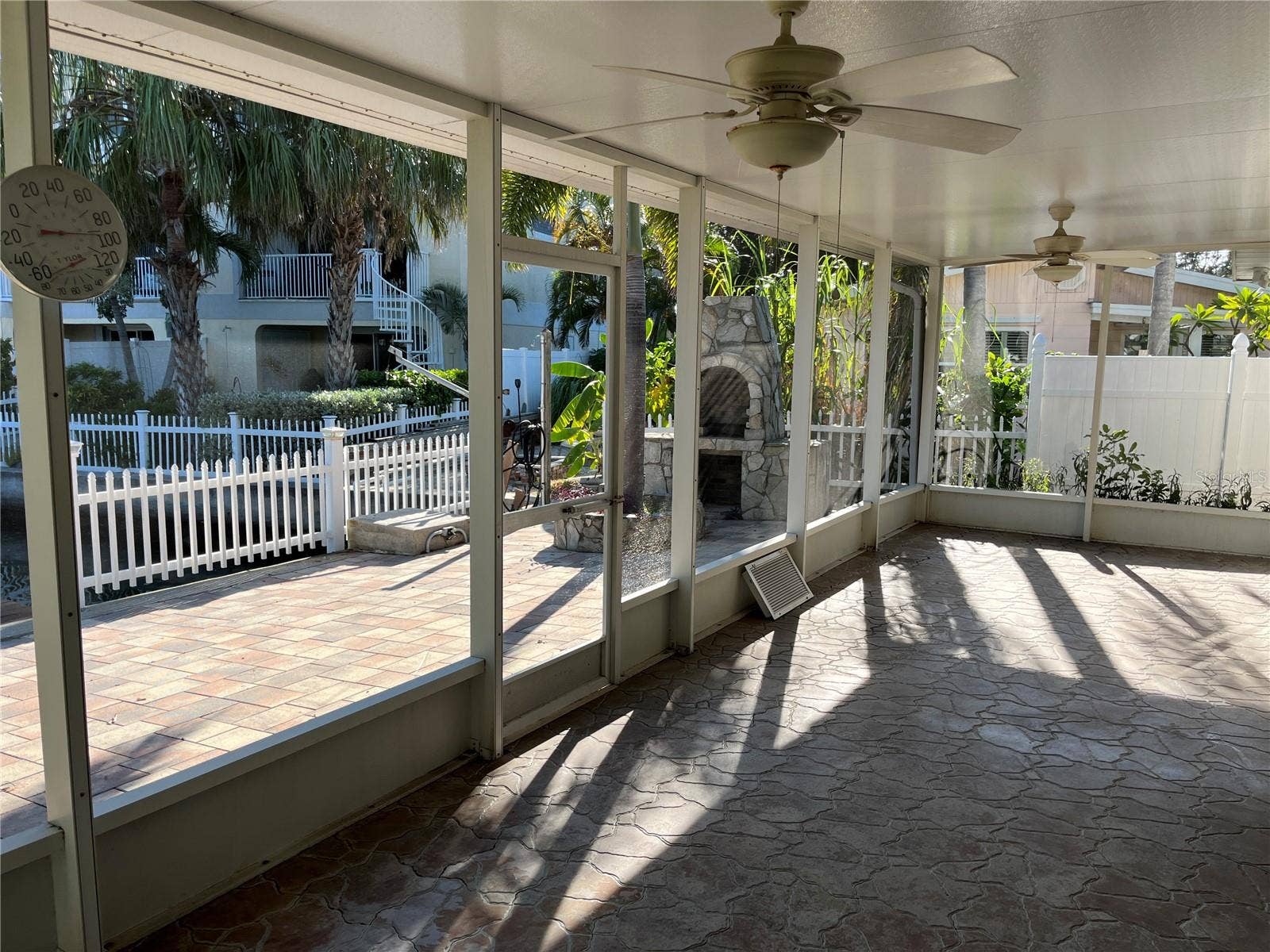 307 LA HACIENDA DRIVE, Indian Rocks Beach, FL 33785 Outdoor covered patio with ceiling fan