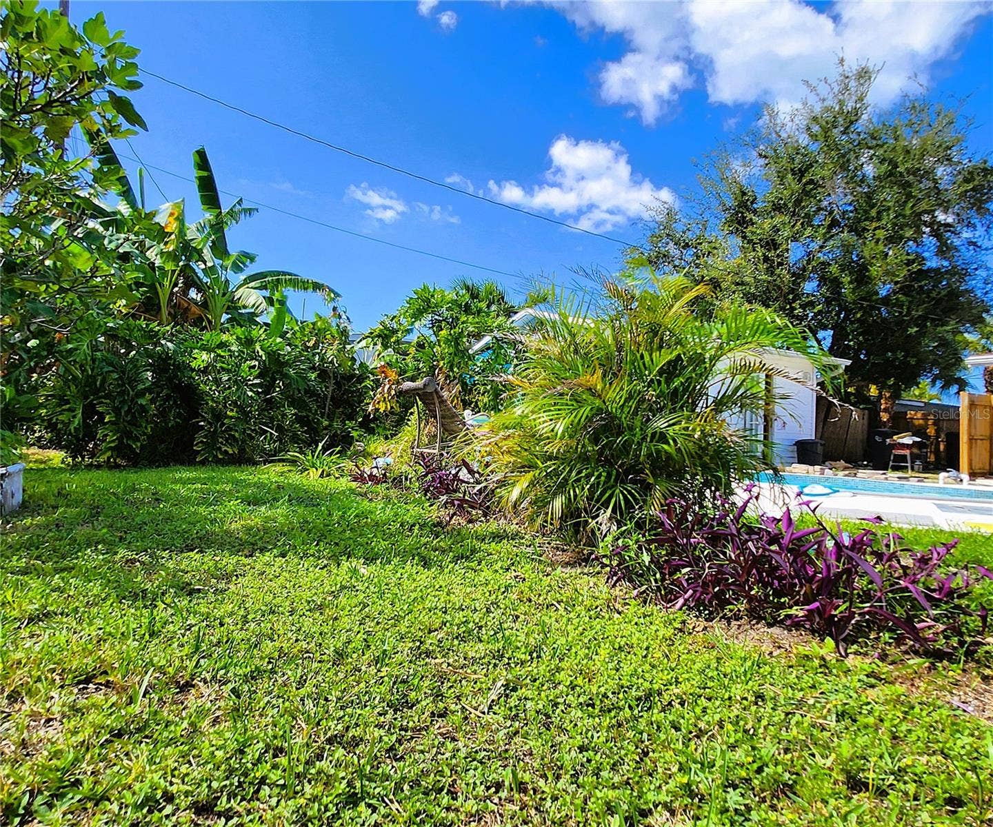 4711 26TH AVENUE W, Bradenton, FL 34209 4711 26th Ave W Bradenton FL 34209: SFH, FLOOD ZONE X! NO HOA, LOT: 102W x 135D, Fully Fenced-in, 3/2, 1656sf, POOL, Propane Gas Fireplace and Water Heater, City Utilities, New Long-Lasting Rubber Mulch