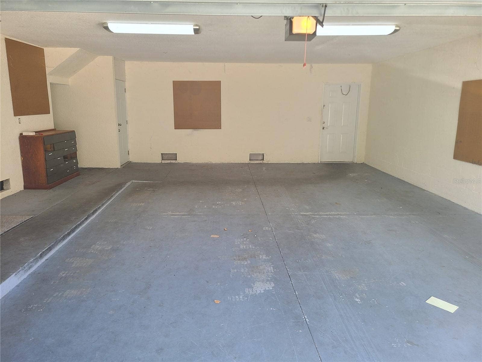 6517 SAND SHORE LANE, New Port Richey, FL 34652 2 Car Garage with storage