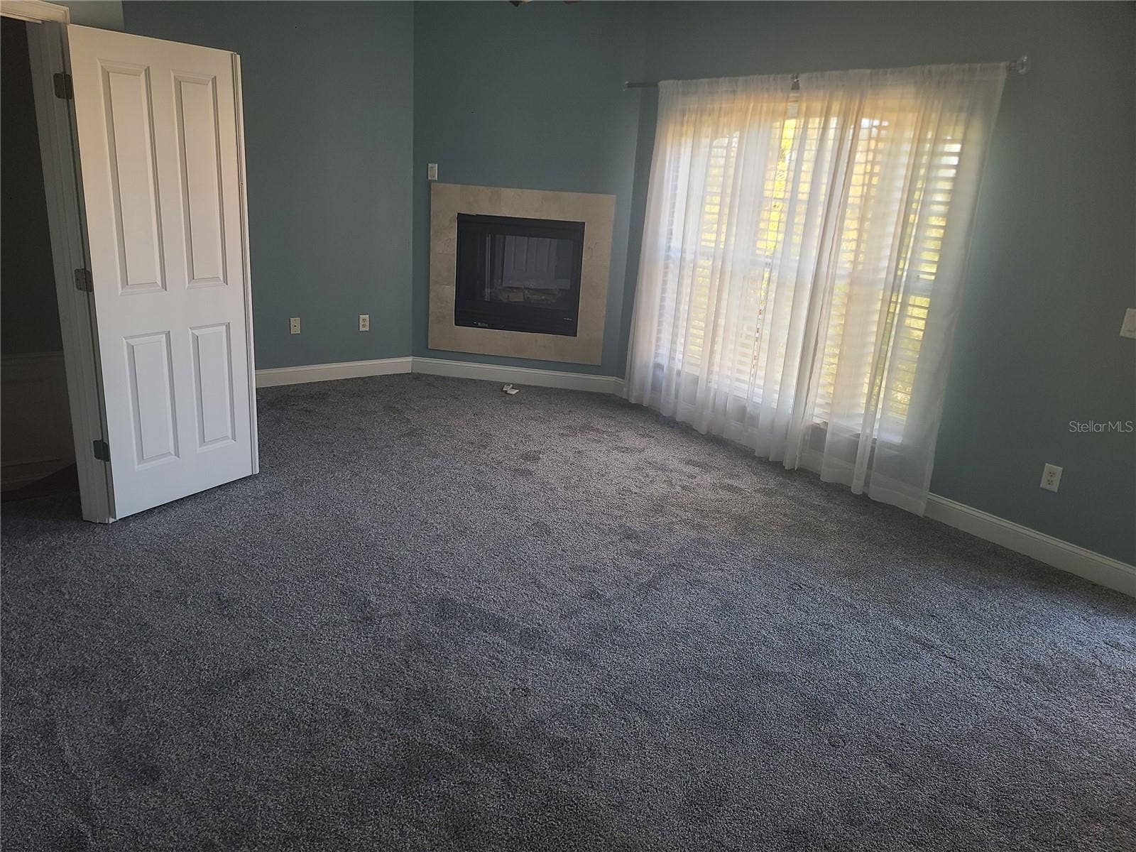 6517 SAND SHORE LANE, New Port Richey, FL 34652 Third Floor Master Bedroom Gas Fireplace