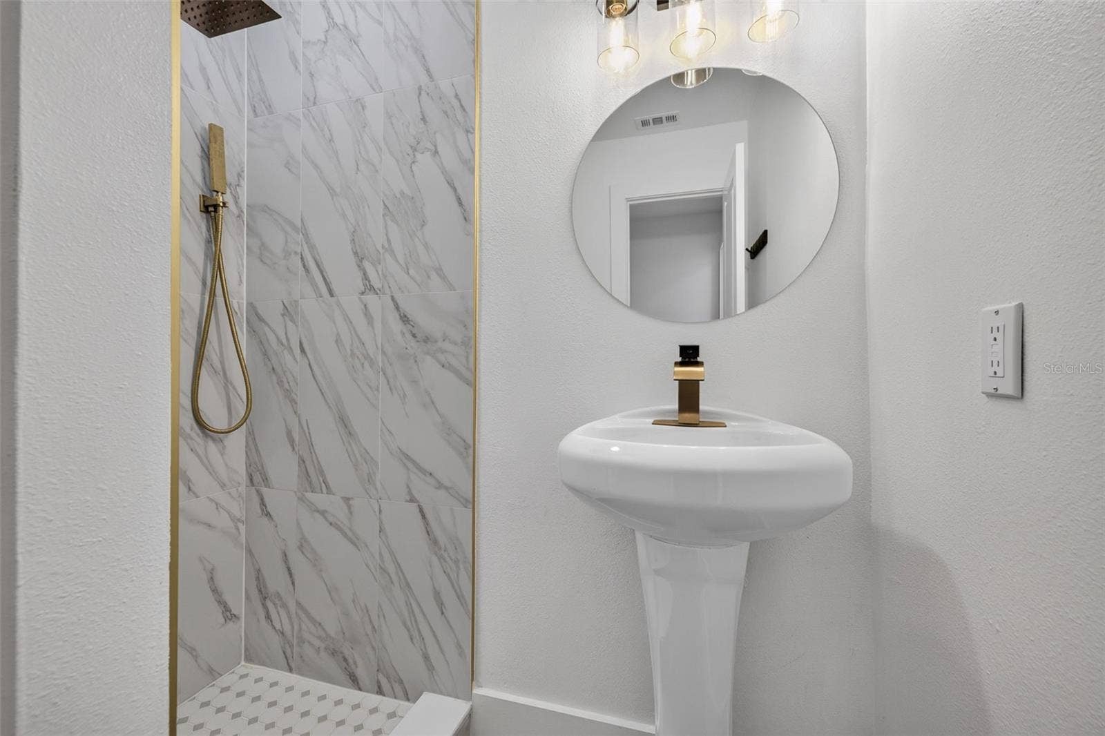 16107 SEA PINES DRIVE, Hudson, FL 34667 Thoughtful updates and contemporary details bring a fresh, modern feel to this private ensuite bathroom.