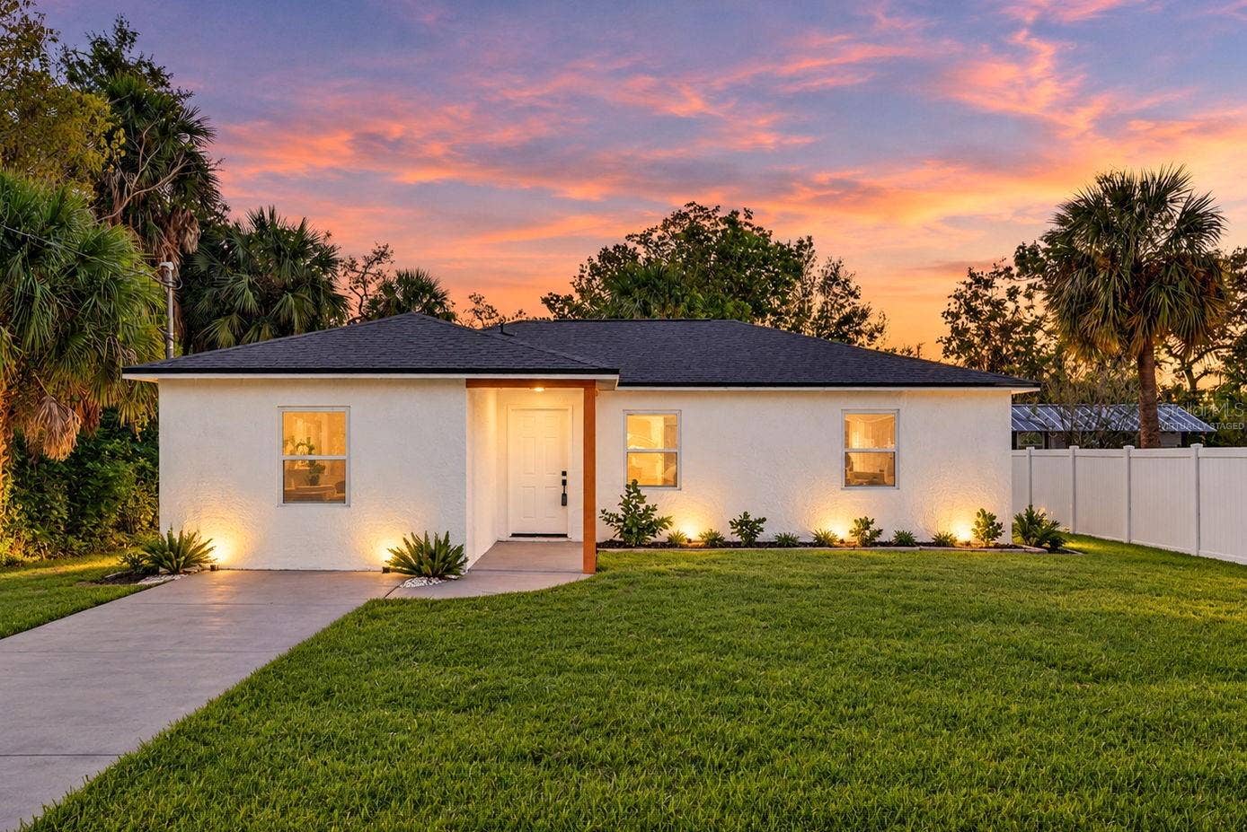 16107 SEA PINES DRIVE, Hudson, FL 34667 Virtually Staged exterior night view