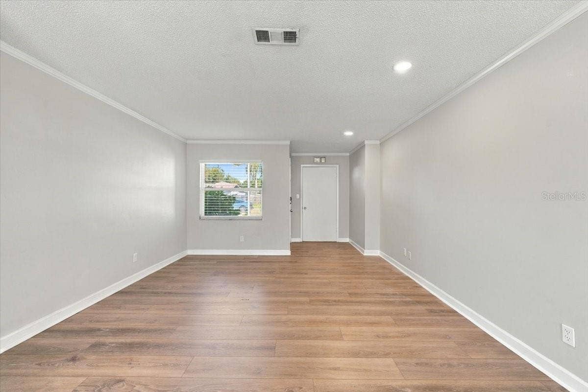 5220 90TH TERRACE N, Pinellas Park, FL 33782 Large living room off the entryway and closet