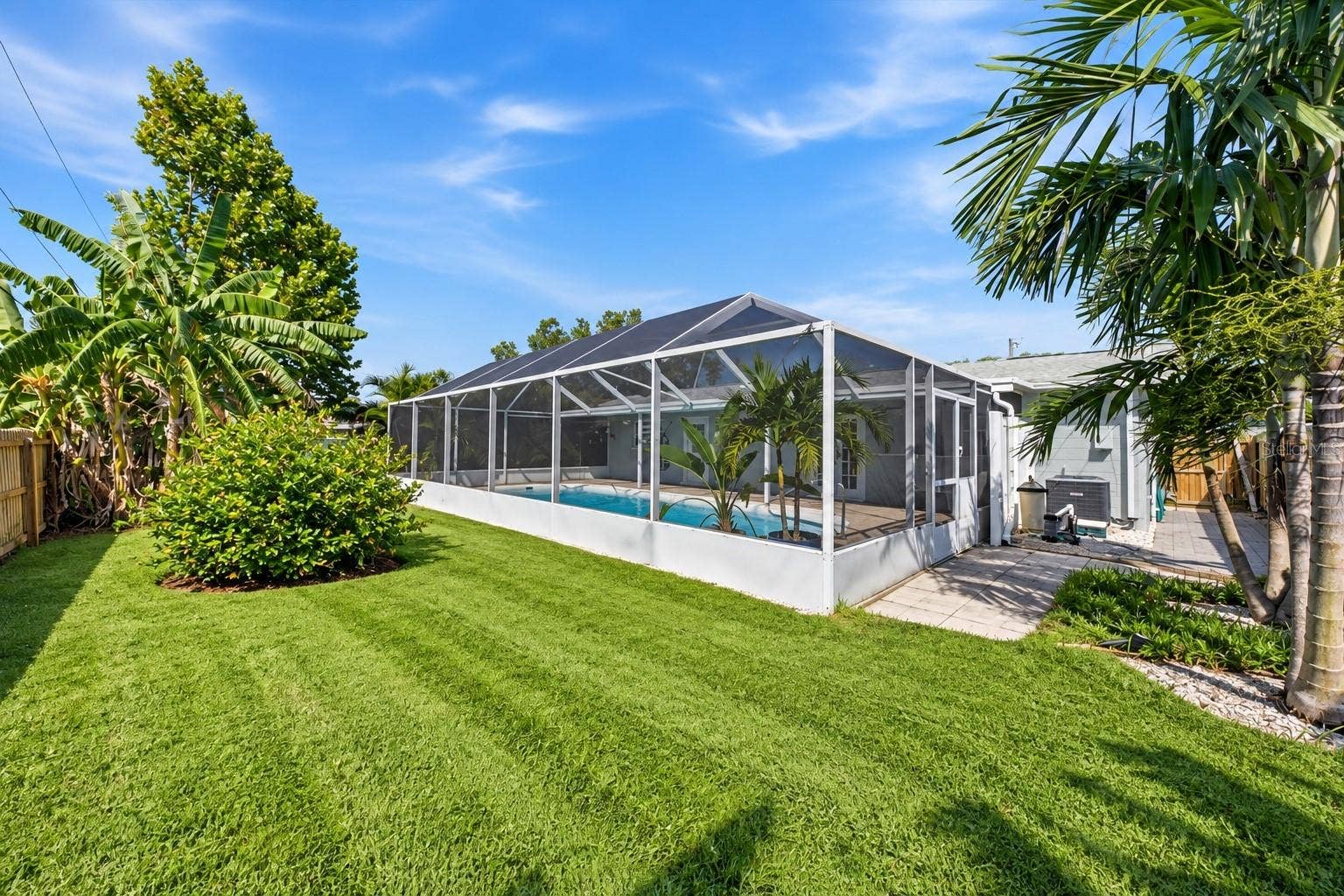 5220 90TH TERRACE N, Pinellas Park, FL 33782 Fruit producing lemon and banana trees!
