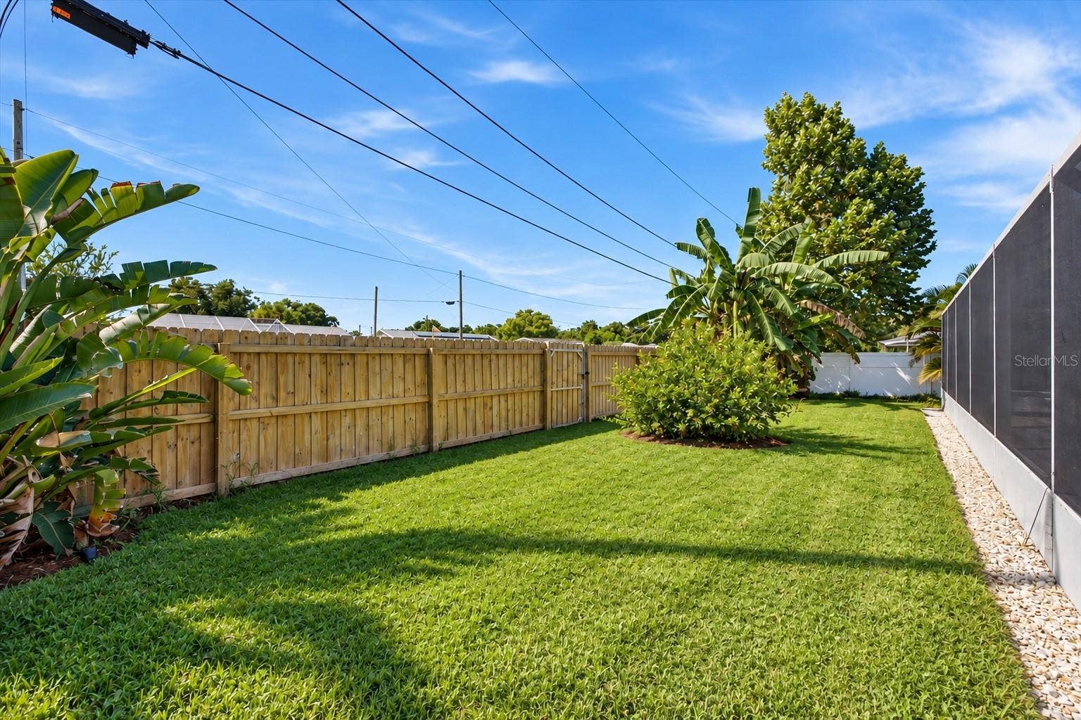 5220 90TH TERRACE N, Pinellas Park, FL 33782 Spacious backyard behind the pool