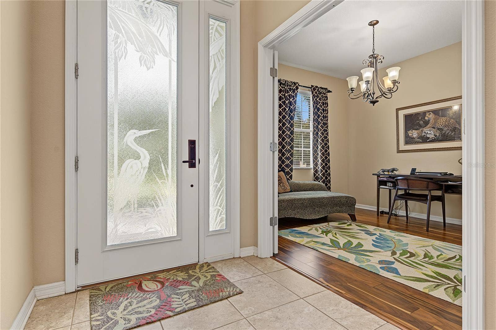 29145 GRASS BUNKER DRIVE, San Antonio, FL 33576 Leaded glass front entry door with sidelight adds natural light