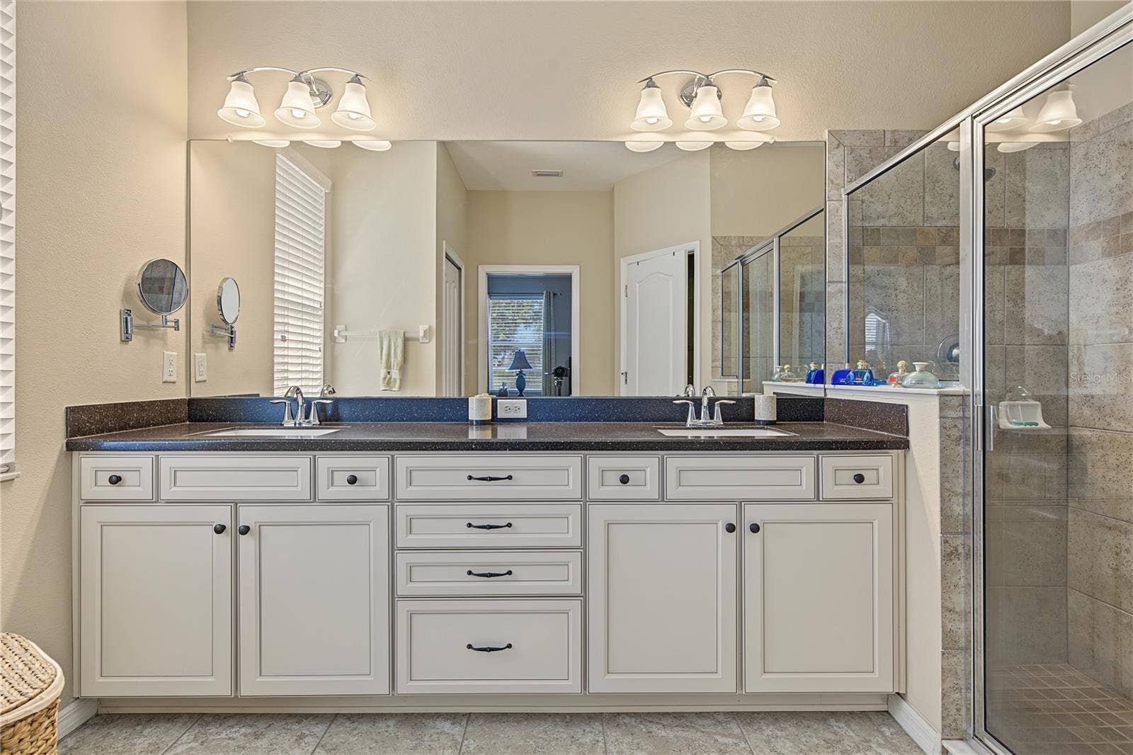29145 GRASS BUNKER DRIVE, San Antonio, FL 33576 Bath ensuite boast raised cabinets and quartz counter with dual sinks