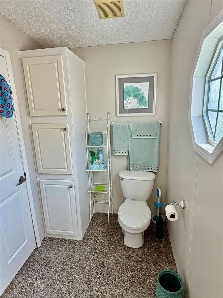 34012 AZALEA DRIVE N, Pinellas Park, FL 33781 Primary suite as a separate shower and toilet room
