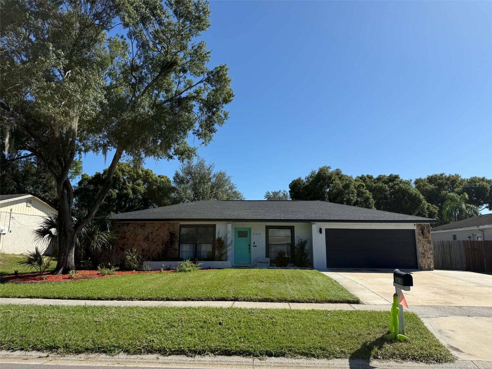 3414 CADE LANE, Valrico, FL 33596 Front with 3 Car Driveway
