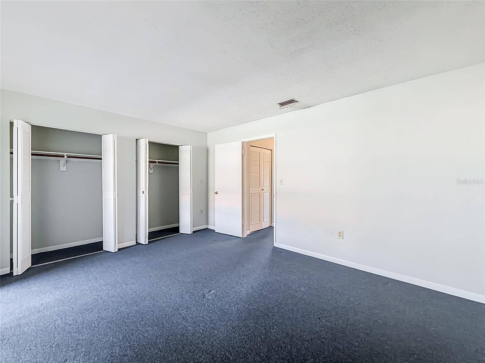 3128 59TH STREET S, #204, Gulfport, FL 33707 Double closets in primary bedroom