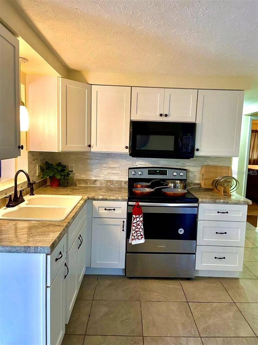 2048 MELODY DRIVE, Holiday, FL 34691 2048 MELODY DRIVE, Holiday, FL 34691