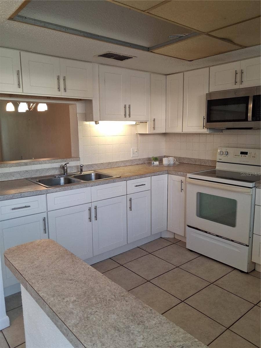 831 MAPLE COURT, #103, Dunedin, FL 34698 831 MAPLE COURT, #103, Dunedin, FL 34698