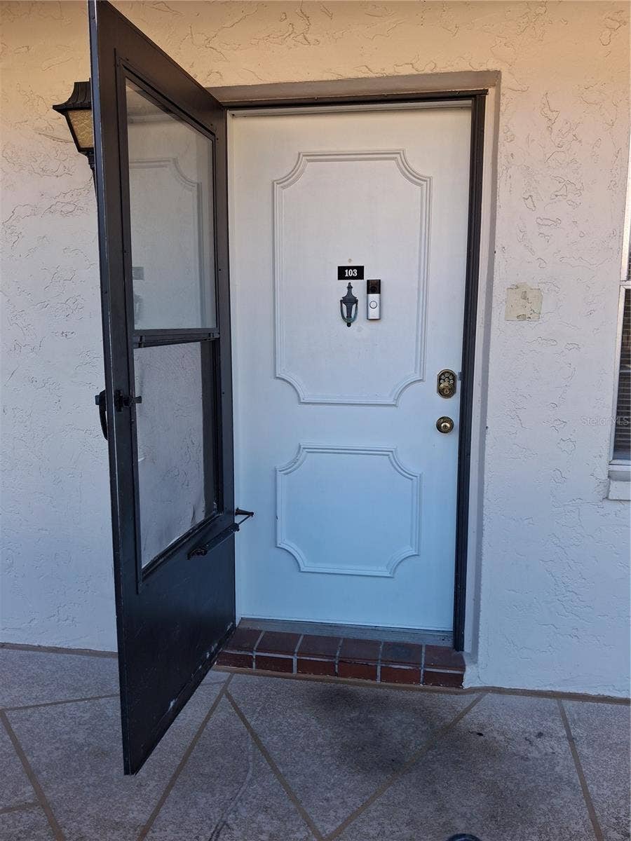 Property photo for 831 MAPLE COURT, #103, Dunedin, FL