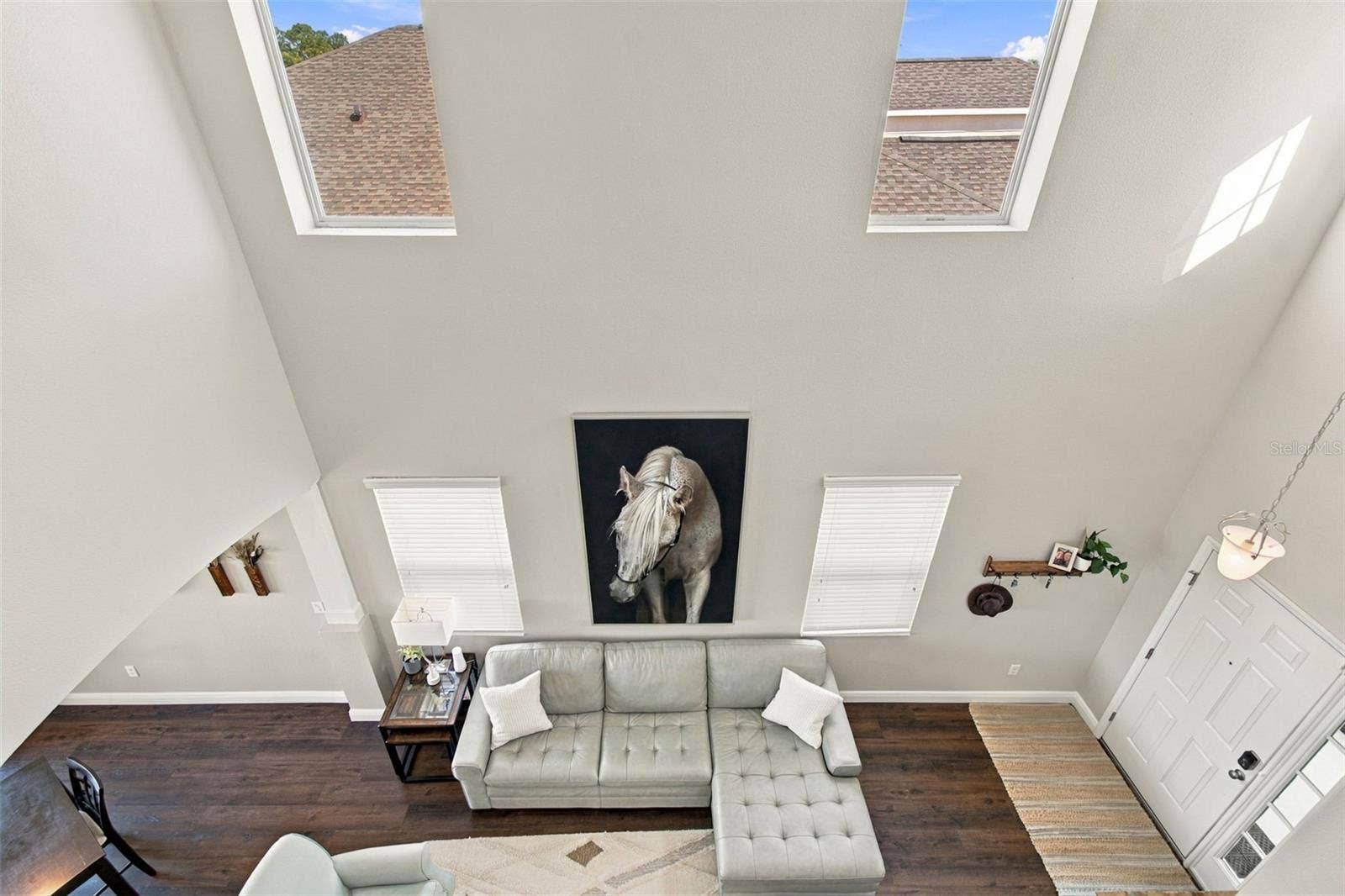 View down to living room and entry
