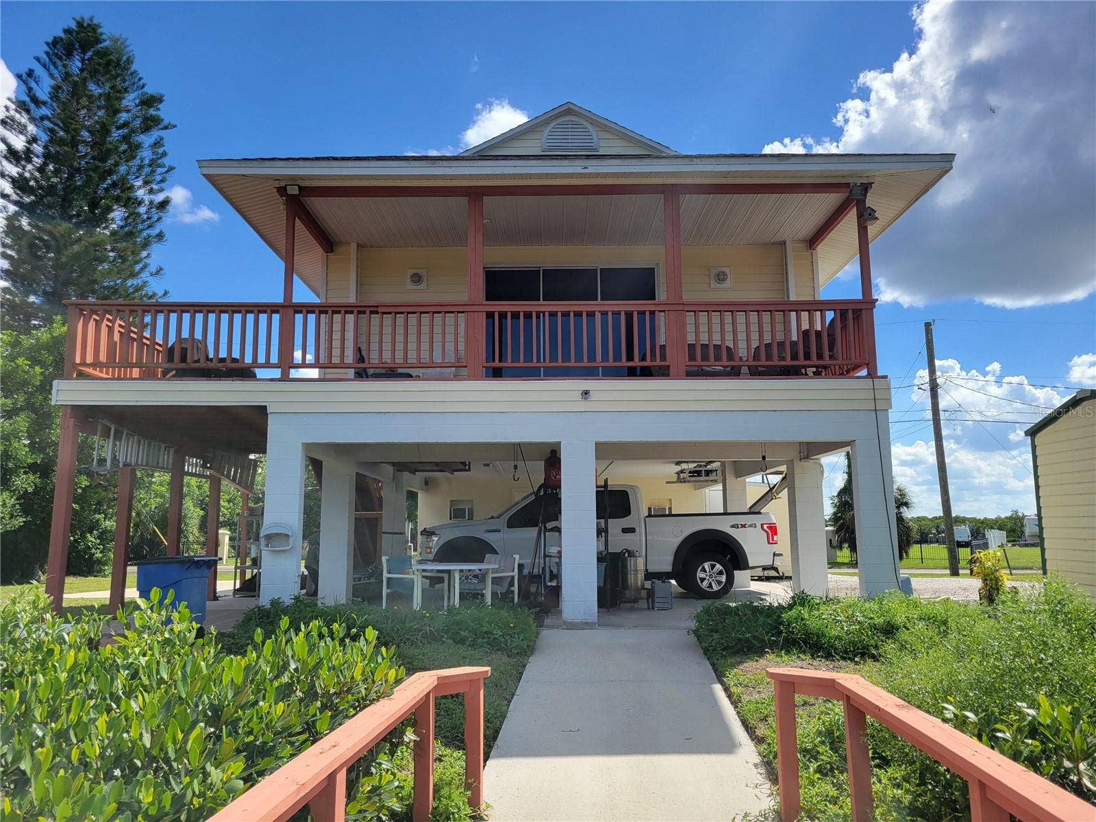 3301 W SHELL POINT ROAD, Ruskin, FL 33570 back with wrap around deck