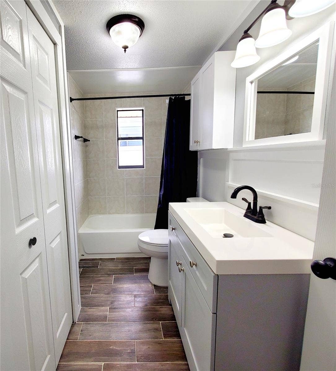 511 2ND AVENUE NE, Largo, FL 33770 REMODELED BATHROOM