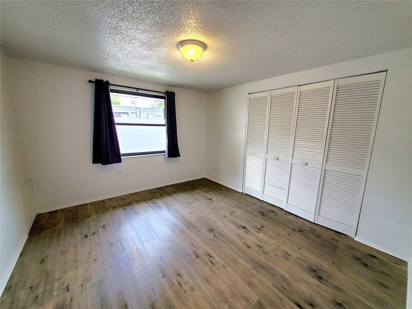 511 2ND AVENUE NE, Largo, FL 33770 HALL BEDROOM