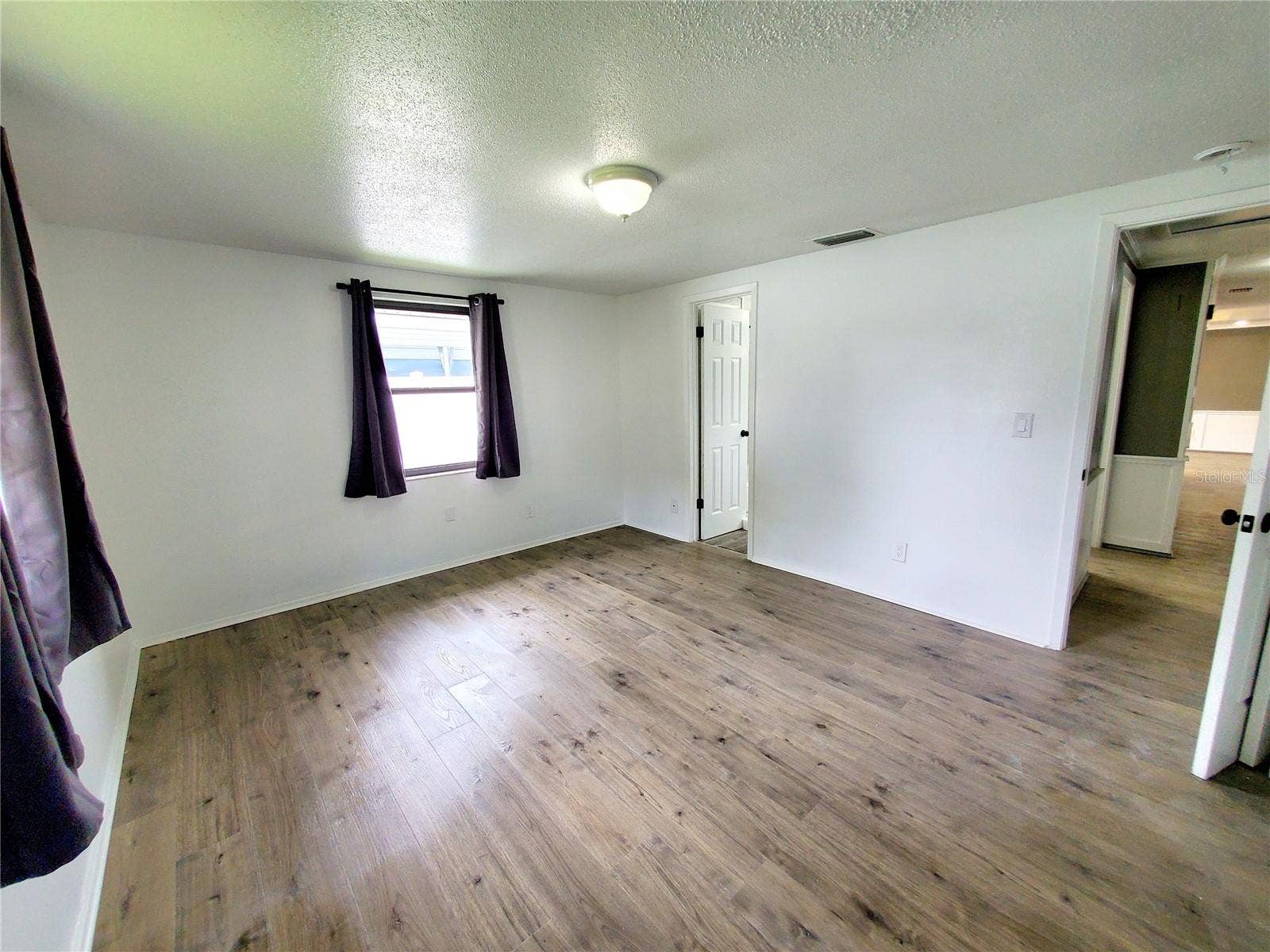 511 2ND AVENUE NE, Largo, FL 33770 MASTER BEDROOM SUITE