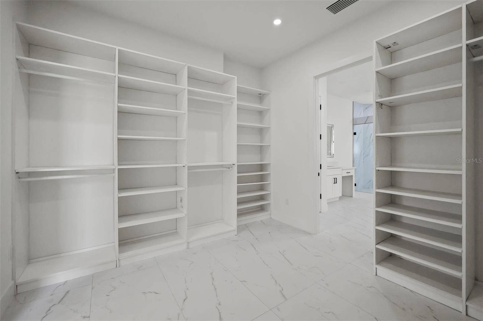 Primary walk-in closet