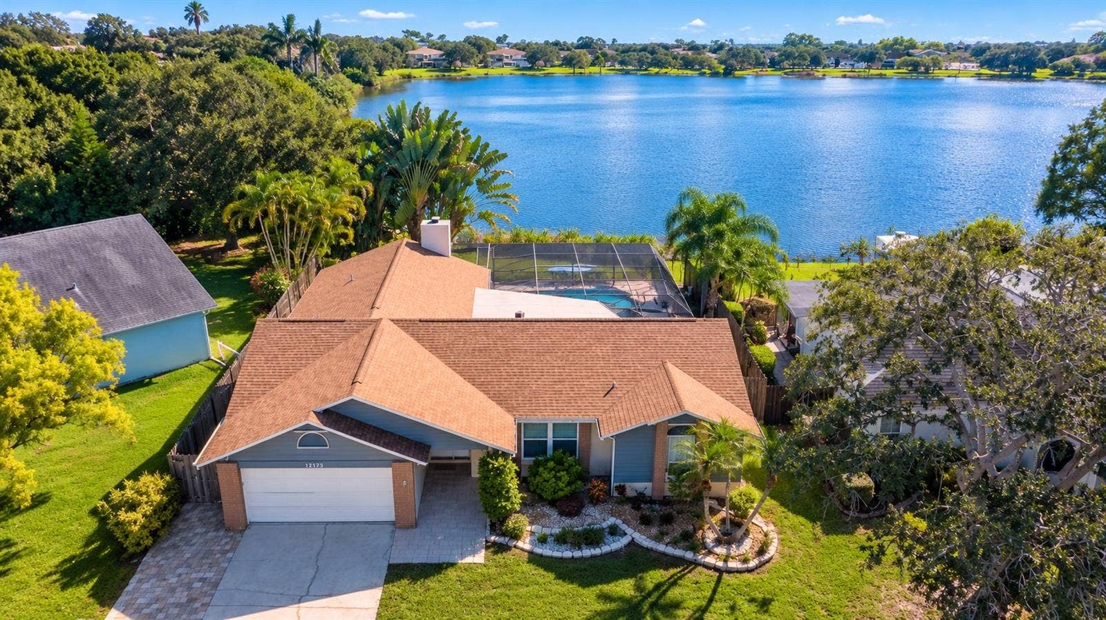 12173 WILD ACRES ROAD, Largo, FL 33773 Stunning Lake Allen Pool home