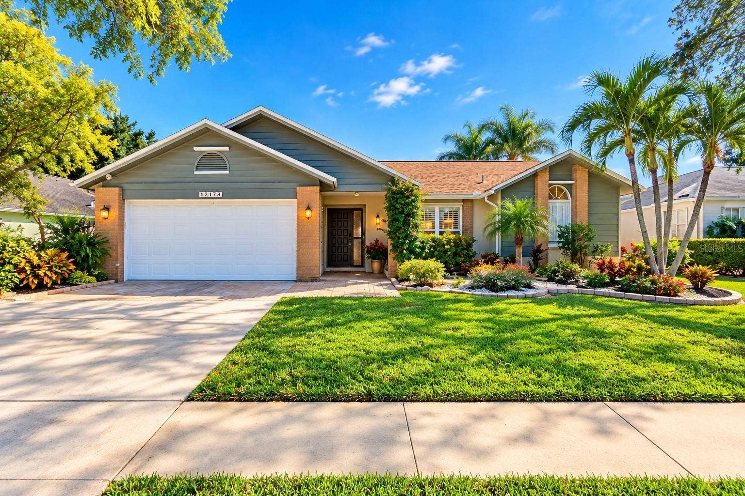 12173 WILD ACRES ROAD, Largo, FL 33773 Front Ext. Driveway Extended with Pavered pad for additional parking