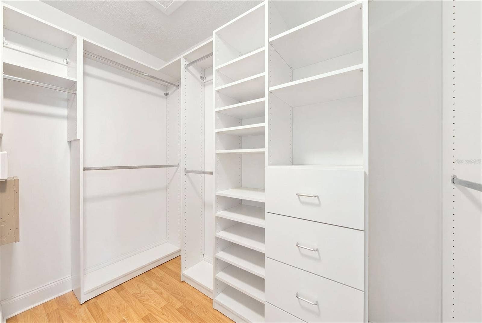 1509 RIDGE SHORE DRIVE, Tarpon Springs, FL 34689 custom built-ins in primary closet