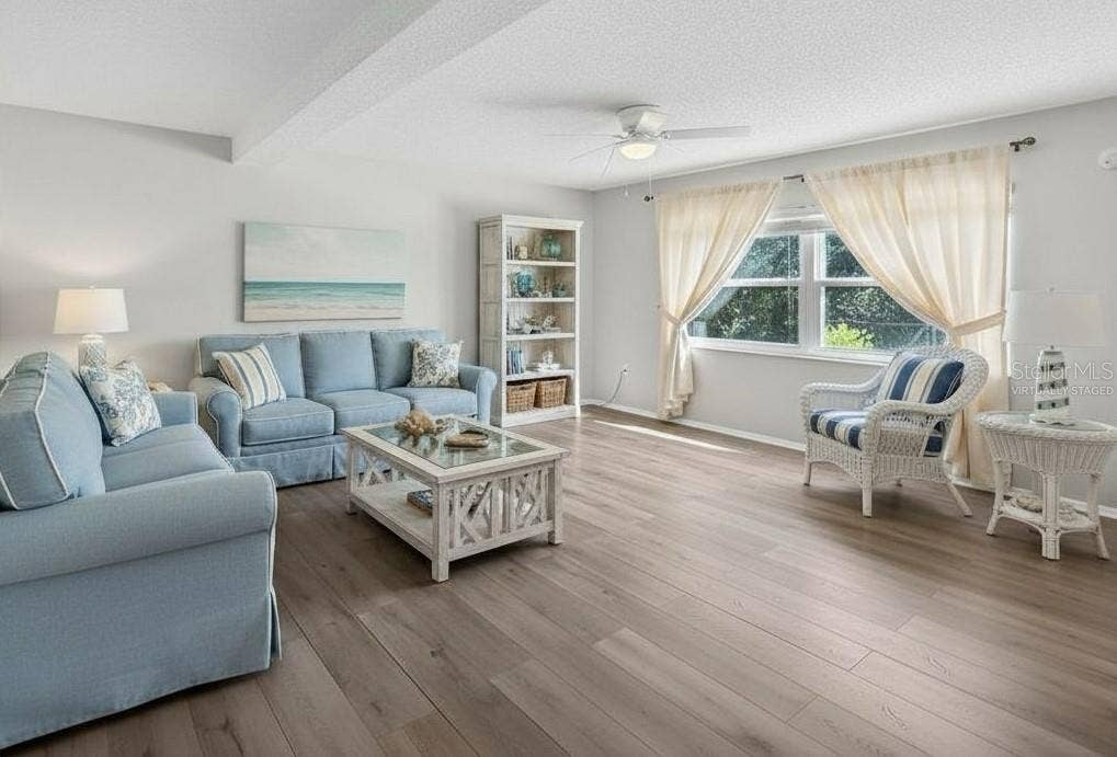 1127 KING ARTHUR COURT, #309, Dunedin, FL 34698 Great Room - Virtually Staged