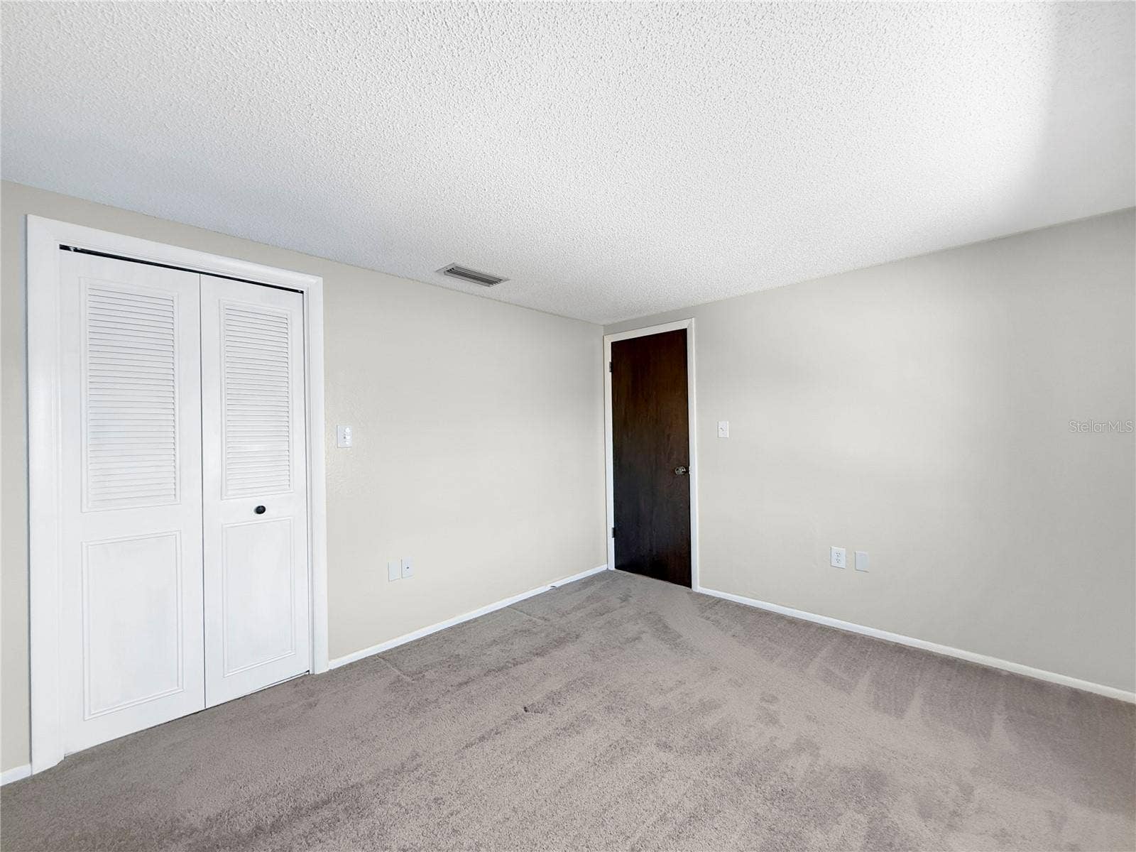 1127 KING ARTHUR COURT, #309, Dunedin, FL 34698 Front Bedroom