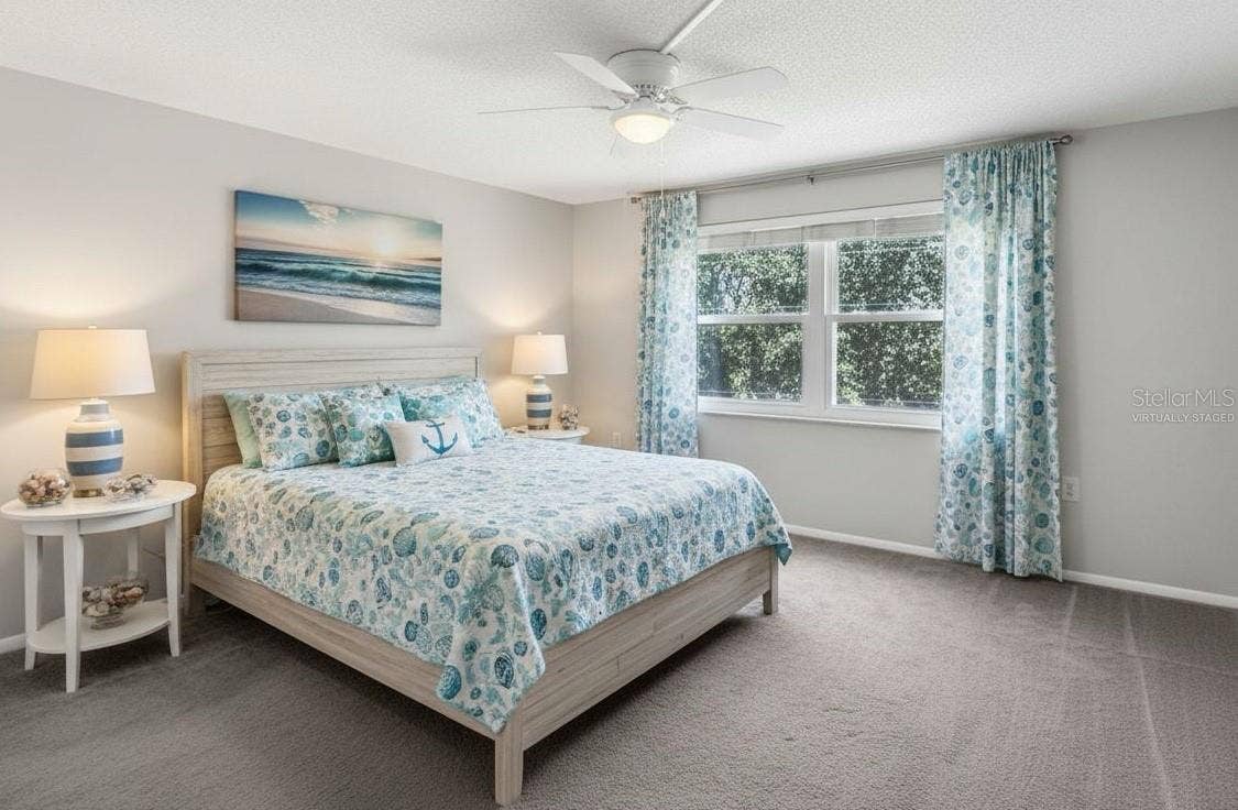 1127 KING ARTHUR COURT, #309, Dunedin, FL 34698 Primary Bedroom - Virtually Staged