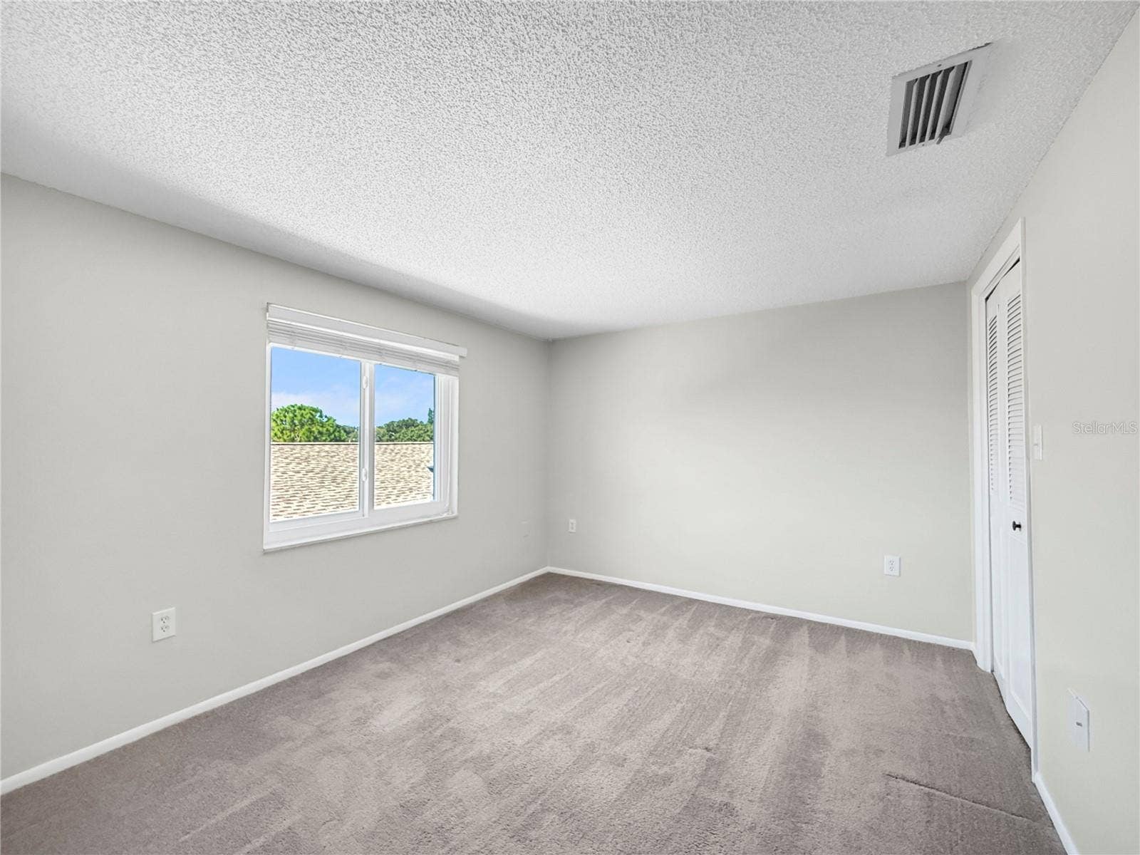 1127 KING ARTHUR COURT, #309, Dunedin, FL 34698 Front Bedroom