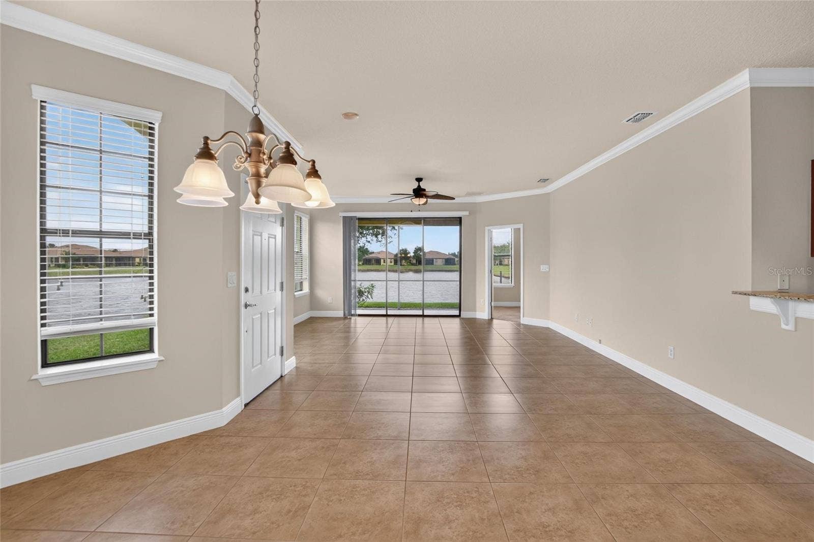 5504 SUNSET FALLS DRIVE, Apollo Beach, FL 33572 Dinning Room and Living Room