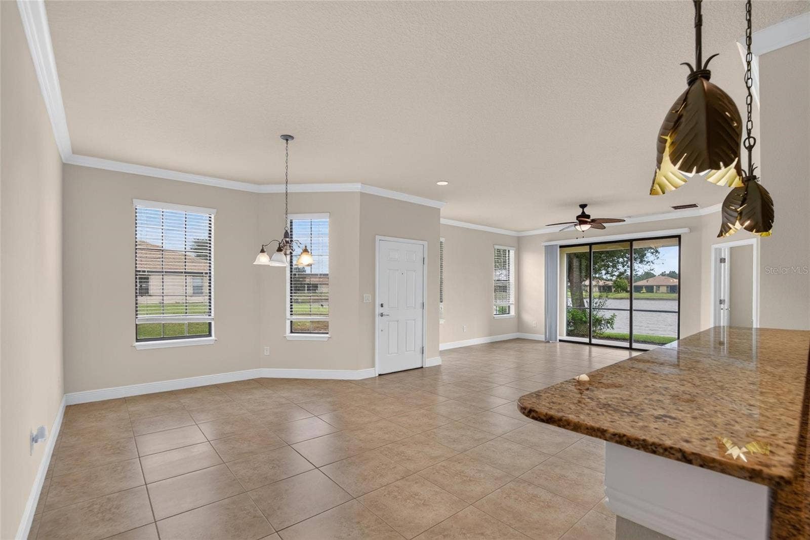 5504 SUNSET FALLS DRIVE, Apollo Beach, FL 33572 Dinning Room and Living Room