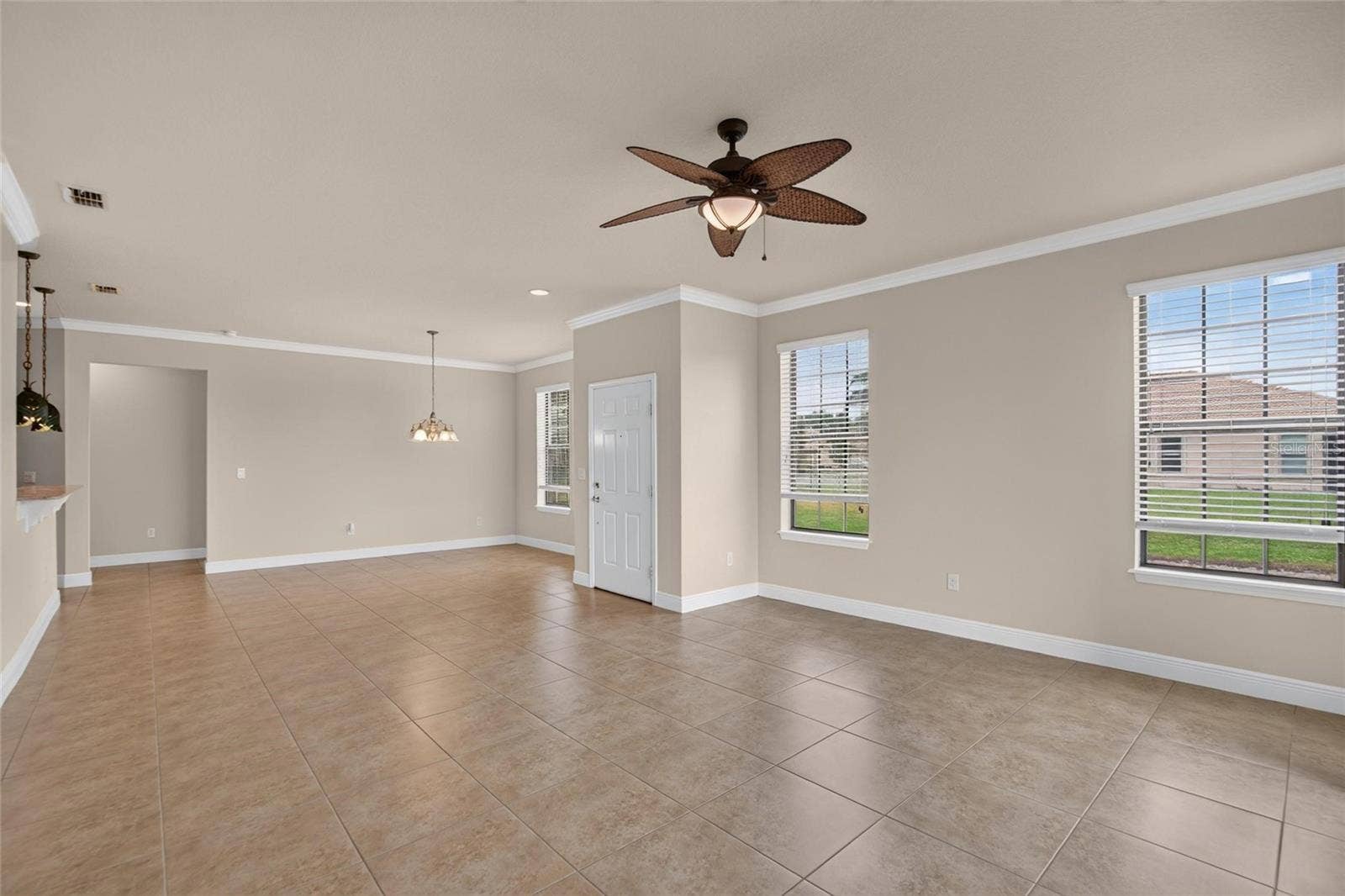 5504 SUNSET FALLS DRIVE, Apollo Beach, FL 33572 Dinning Room and Living Room