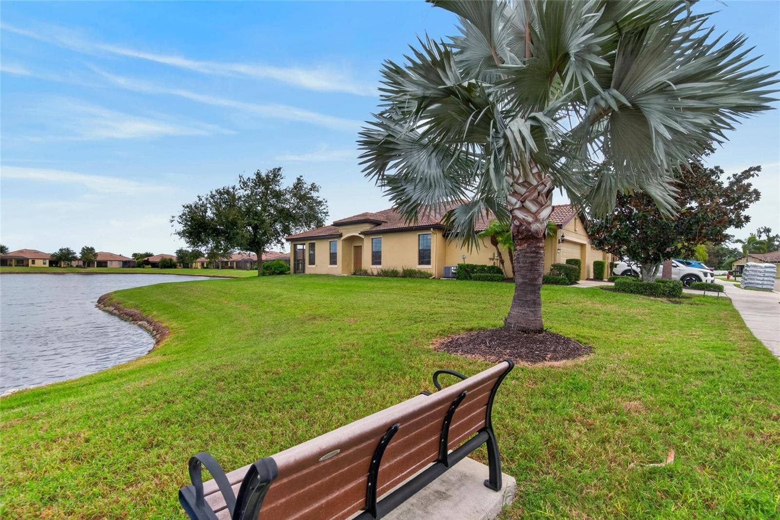 5504 SUNSET FALLS DRIVE, Apollo Beach, FL 33572 Side villa of villa