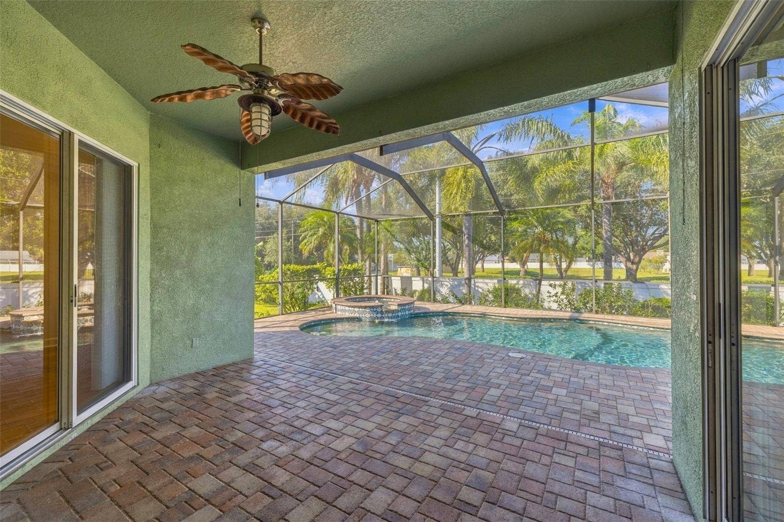 3916 VALRICO GROVE DRIVE, Valrico, FL 33594 Under Roof Entertaining area is ready for your furniture to enjoy the beautiful Outdoors!