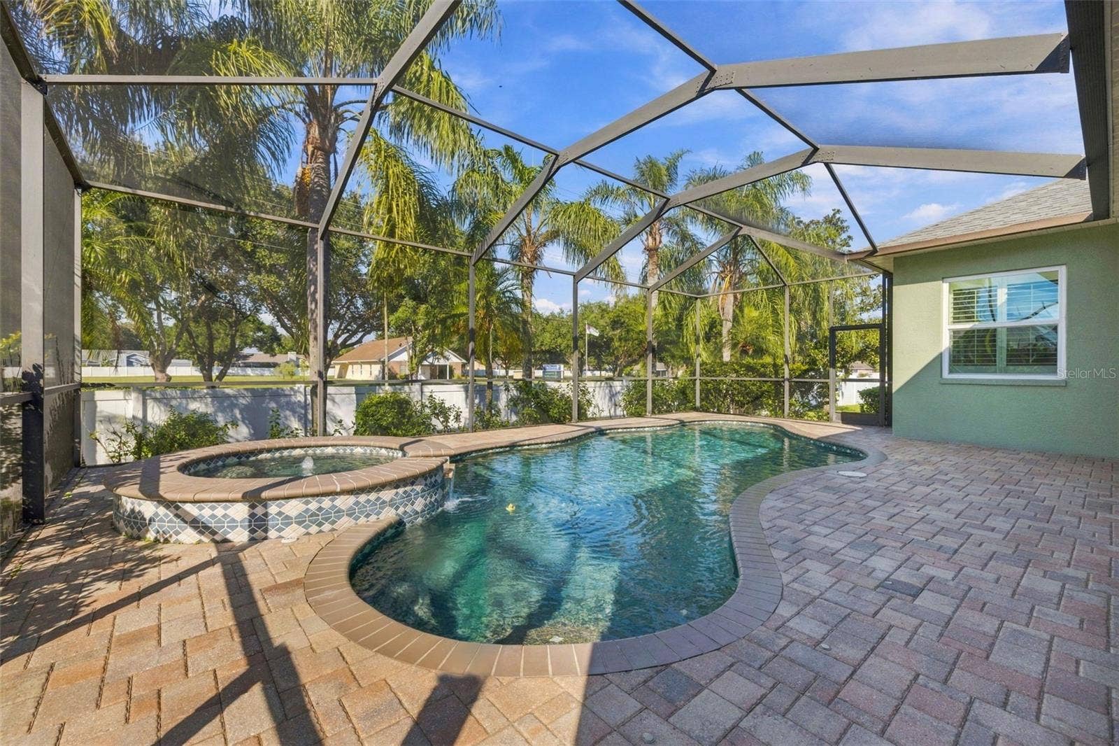 3916 VALRICO GROVE DRIVE, Valrico, FL 33594 Paver Pool and Spa area is fully Caged/Screened for your bug free enjoyment!