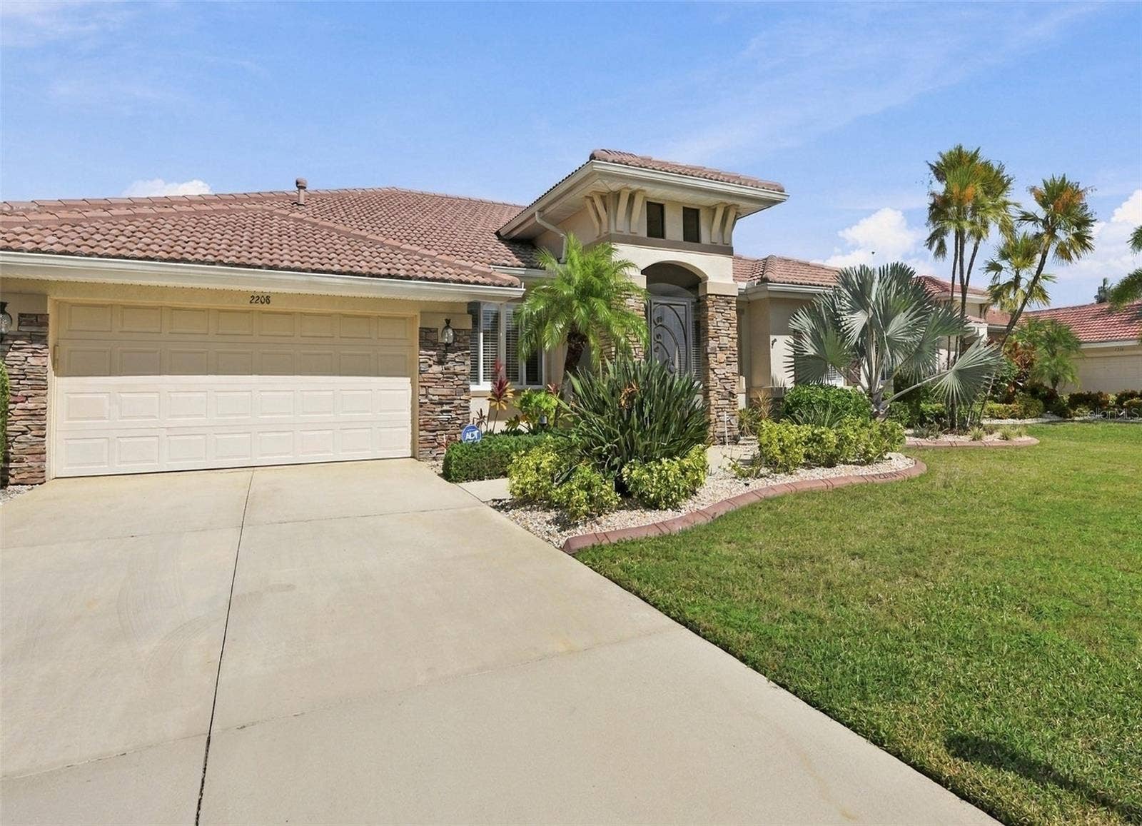 Wide driveway and double garage ensures plenty of parking space for family and friends.