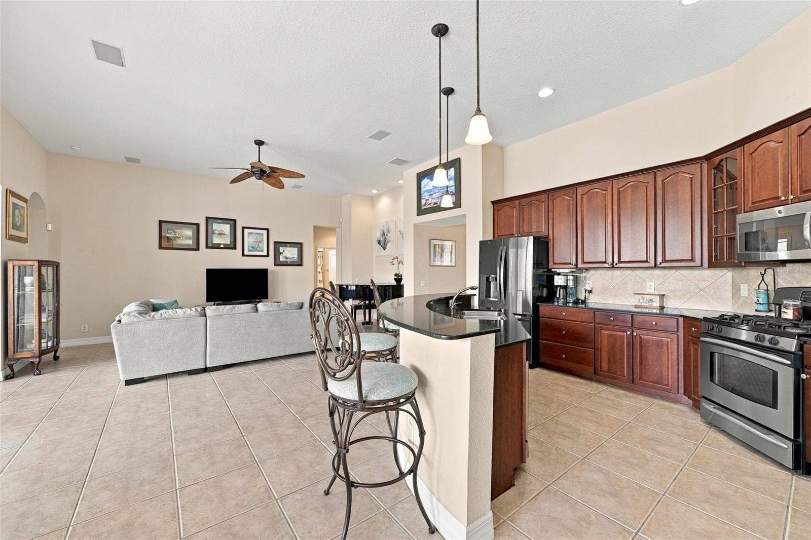 An open floor plan always allows you to be in the middle of the action, even in the kitchen.