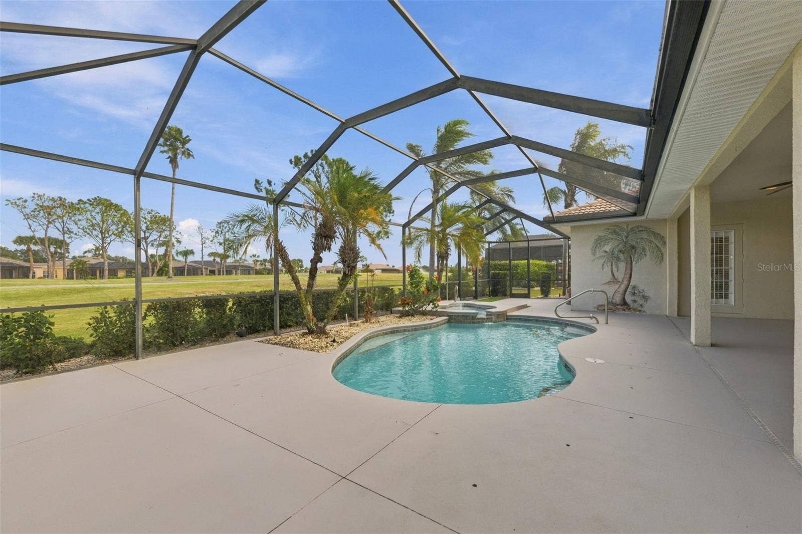 Exquisite deck area, pool and spa (with a fountain) provide the perfect getaway and space for Florida living, while you watch the world go by.  There are even planting areas, where pets can even find their own space.