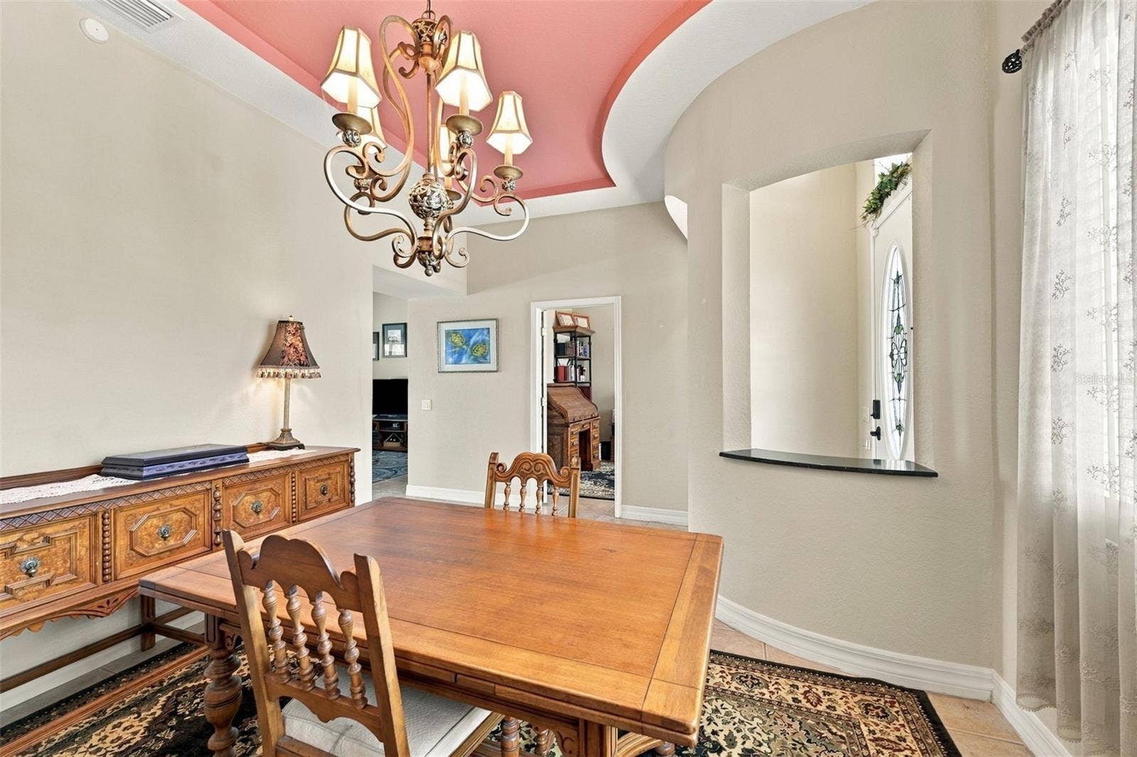 If you don't need a dining room, this room is perfect as a music room, elegant living room or library, due to it's unique architectural features.