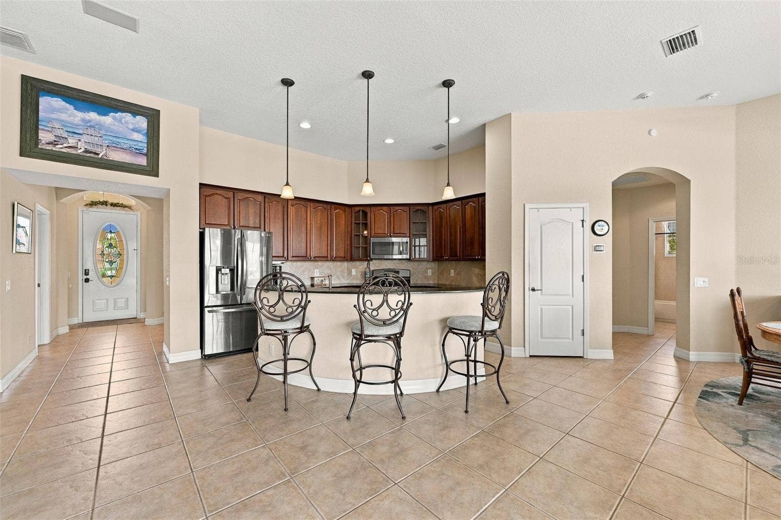 You even have a walk-in pantry.  Notice the arched doorways continue threw the rest of the home.