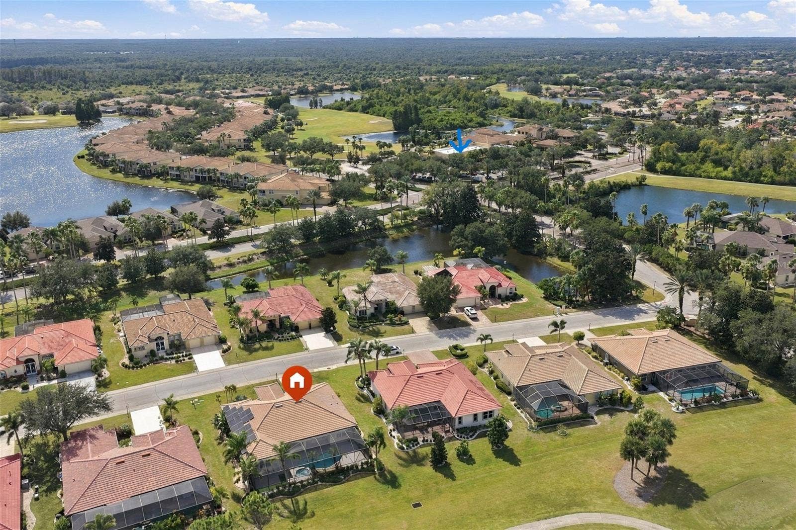 Aerial Photo - NOTE CLUB HOUSE IS THE BLUE ARROW, CENTER TOP OF PICTURE.  It is just a 3 minute walk!