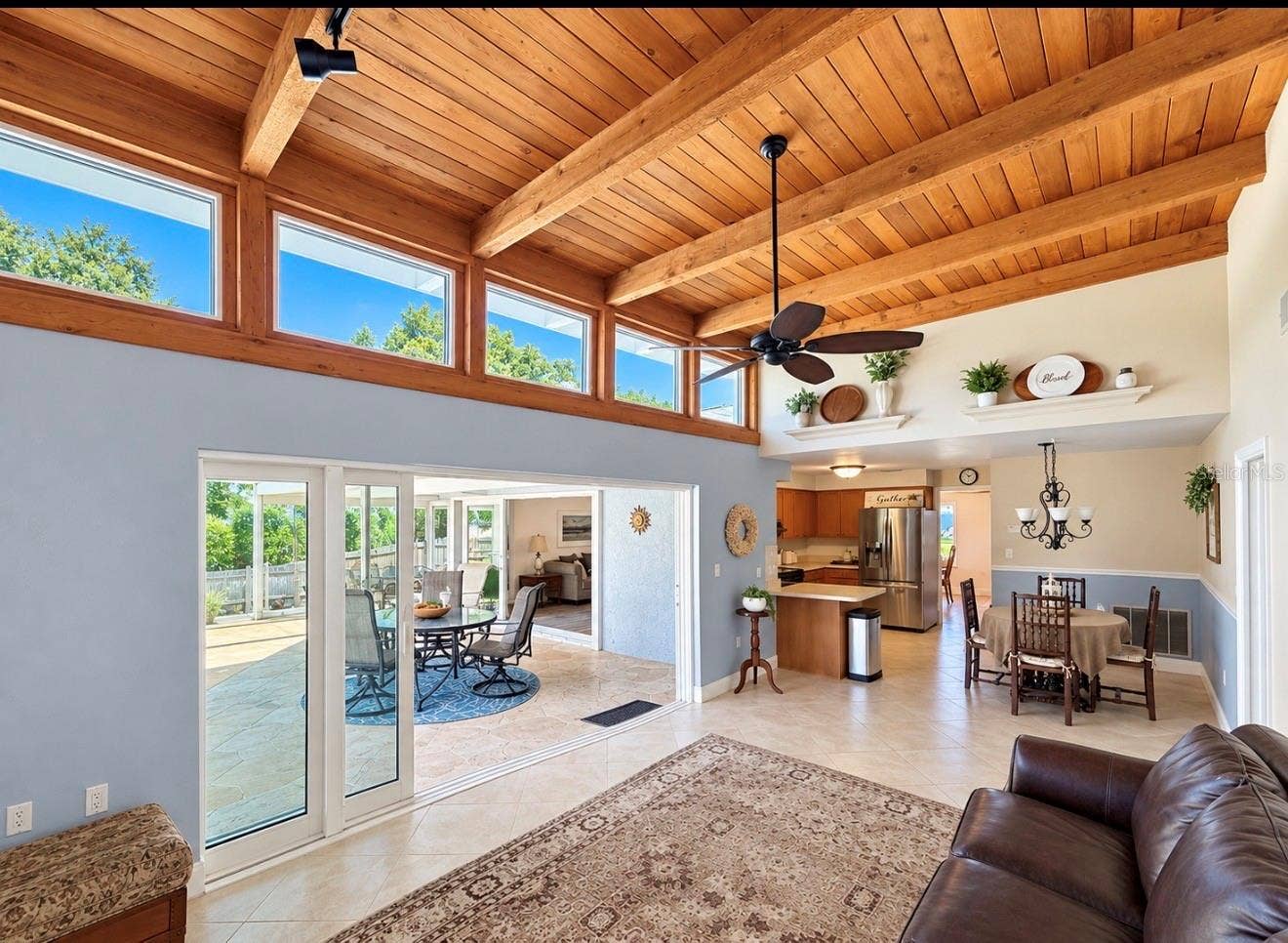 9690 LEEWARD AVENUE, Largo, FL 33773 Family room opens to pool lanai