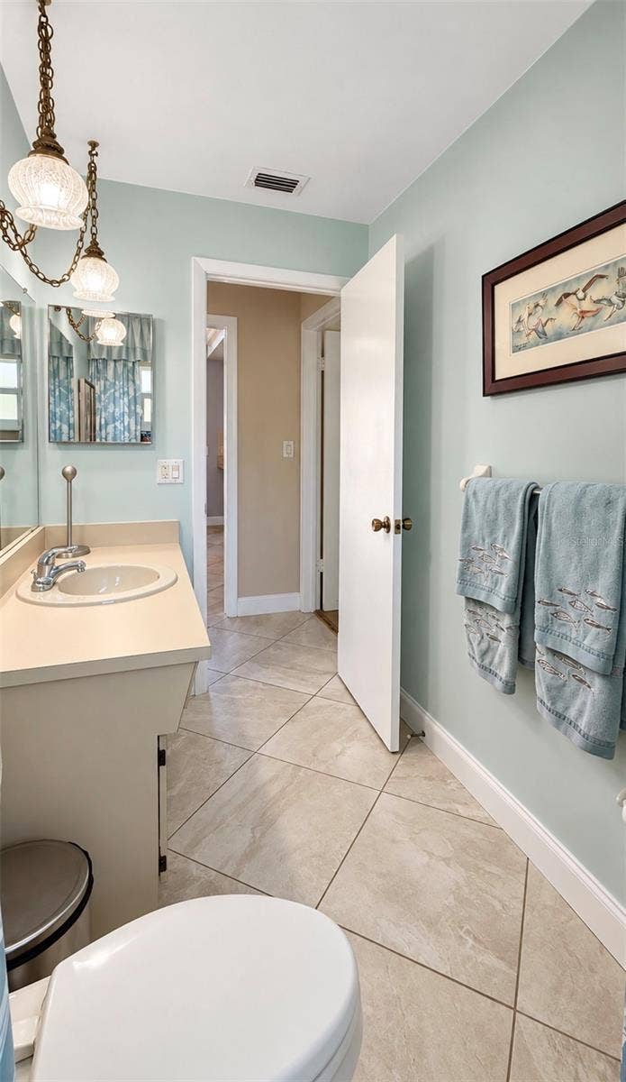 9690 LEEWARD AVENUE, Largo, FL 33773 Hallway bathroom