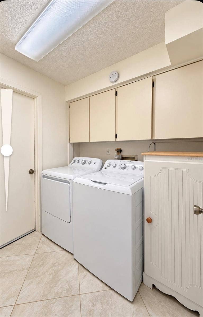 9690 LEEWARD AVENUE, Largo, FL 33773 inside laundry room